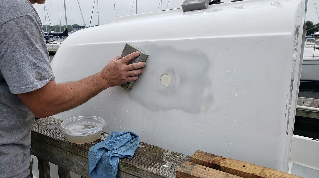 wet sanding gelcoat in a wide feather zone around a fiberglass hull repair