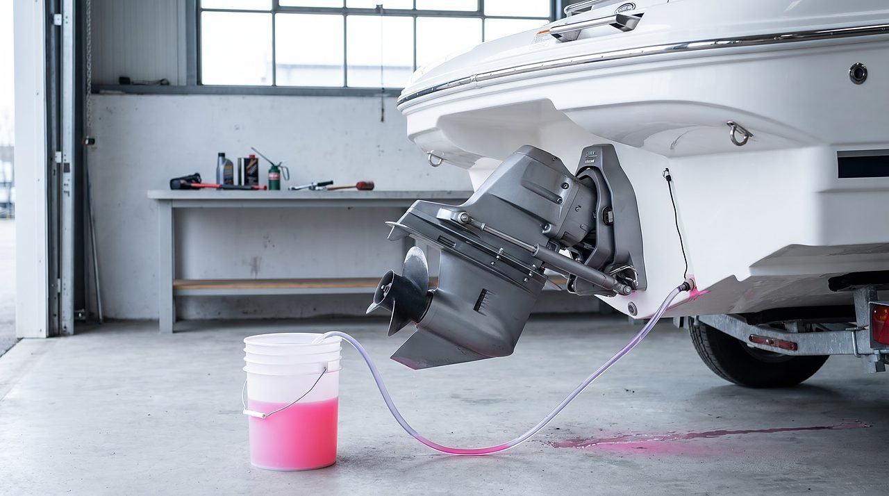 Pink propylene glycol antifreeze circulating through a sterndrive raw water cooling system